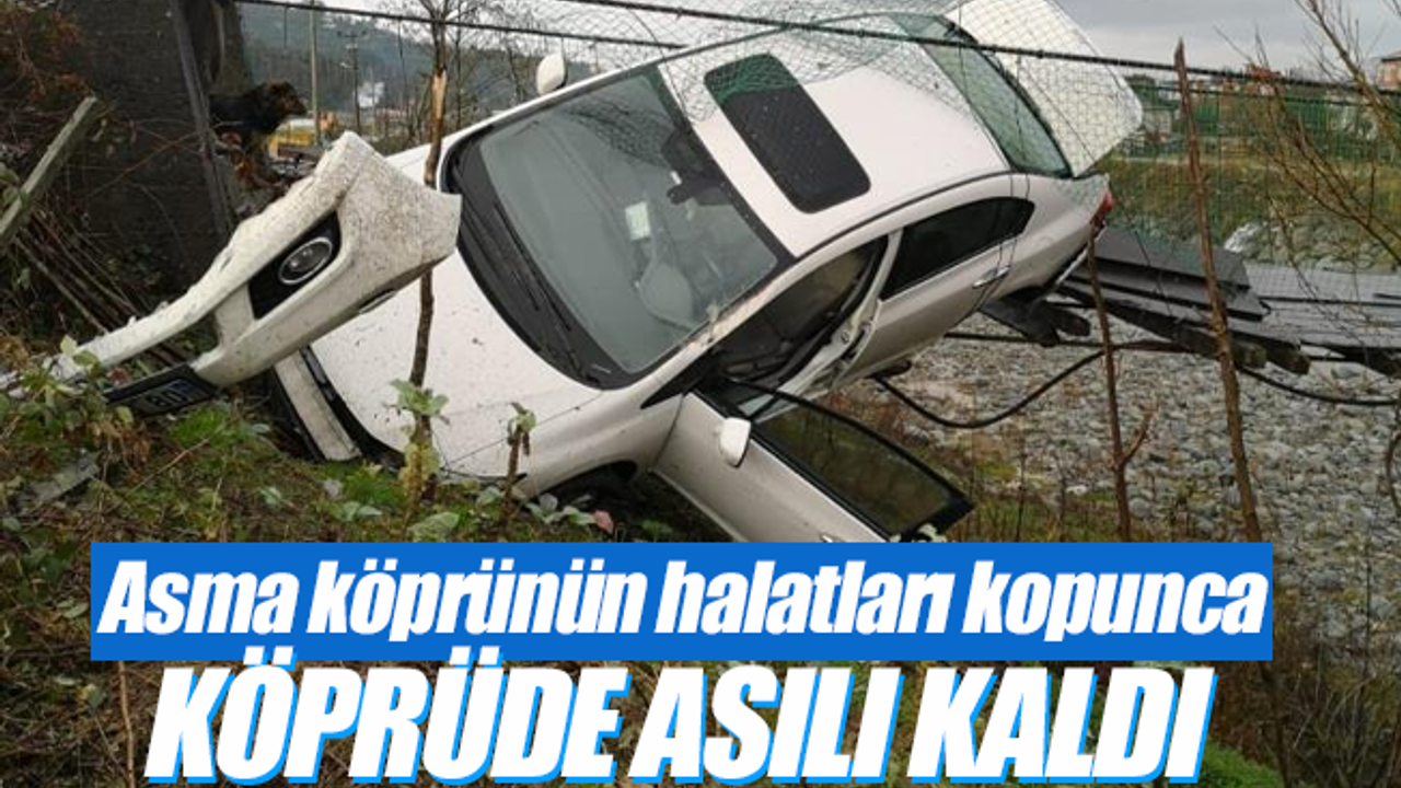 Asma köprünün halatları kopunca aracıyla köprüde asılı kaldı