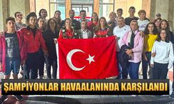 Dünya Şampiyonu kanocular havaalanında karşılandı