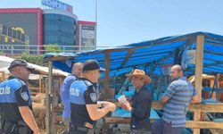 Polis ekiplerinden kurban pazarında sahte para uyarısı
