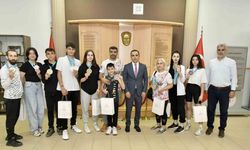 Şampiyon sporculardan Osman Ercan’a ziyaret