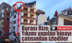 Yıkımı yapılan binayı çatısından izlediler