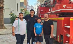 10 yaşındaki Tunahan’ın ağaca takılan helikopterini itfaiye kurtardı