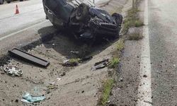 Takla atan otomobilden 2 kişi yaralı kurtuldu