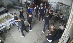 Sopa, kürek ve av tüfekli meydan savaşını andıran kavga kamerada