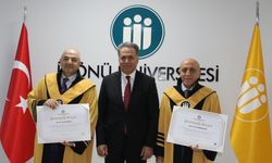 Unvanda yükselen akademisyenlere cübbeleri giydirildi