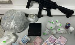 Cinayet zanlısı, hobi bahçesinde otomatik silah ve uyuşturucuyla yakalandı