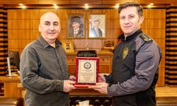 Bilecik İl Emniyet Müdürü Çağlar, emekli polis Aykan'a plaket takdim etti