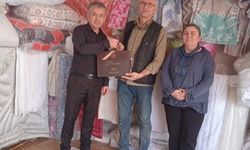 Tavşanlı'da 40 yılı aşkın esnafa ziyaret ve hediye