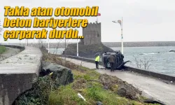 Takla atan otomobil beton bariyere çarparak durdu