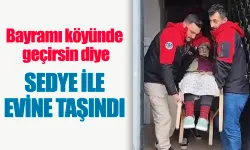 Bayramı köyünde geçirsin diye sedye ile evine taşındı