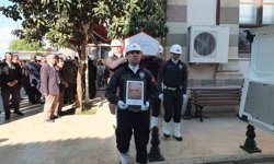 Burhaniye'de emekli müdür törenle toprağa verildi