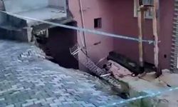 Çöken istinat duvarı binada hasar oluşturdu