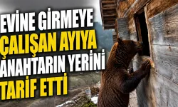 Evine girmeye çalışan ayıya anahtarın yerini tarif etti