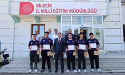 Dünya şampiyonlarına başarı belgeleri verildi