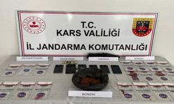 Kars'ta zehir tacirlerine darbe: 7 tutuklama, uyuşturucu ve sahte dolar ele geçirildi