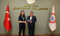 Rektör Özölçer Dünya Şampiyonu Basancı'yı kabul etti