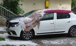 Doluya karşı ilginç önlem: Araçların üzerine battaniye serdiler