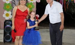 Köyceğiz'de Muhtar Acar'dan başarılı öğrenciye ödül