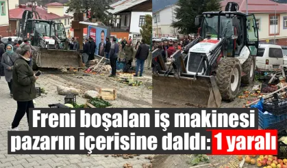 Freni boşalan iş makinesi pazarın içerisine daldı: 1 yaralı