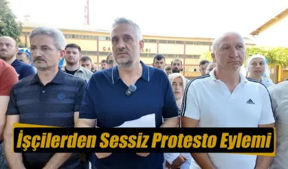 İşçilerden sessiz protesto ve oturma eylemi