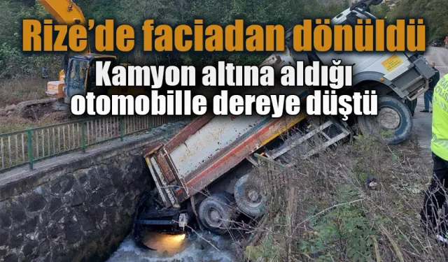 Kamyon altına aldığı otomobille dereye düştü, faciadan dönüldü