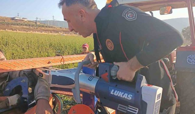 Hortum sarma makinesine kolu sıkışan işçi kurtarıldı