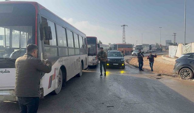 Suriye'de Şeyh Maksud Mahallesine gelen 20 otobüs, teslim olan SDG'li teröristleri farklı bölgelere götürecek