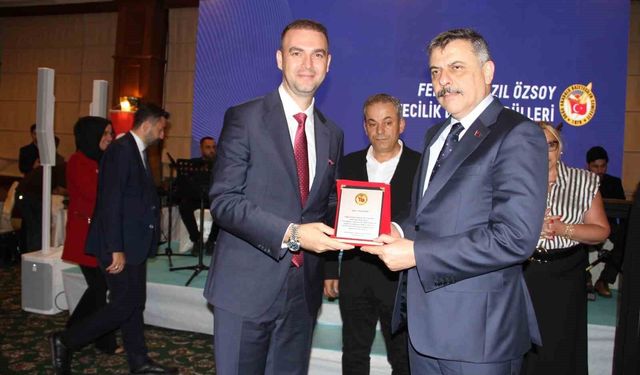 Aras Elektrik'e teşekkür plaketi