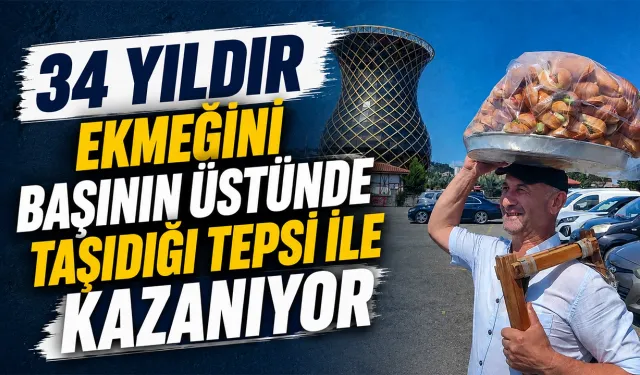 34 yıldır ekmeğini başının üstünde taşıdığı tepsi ile kazanıyor